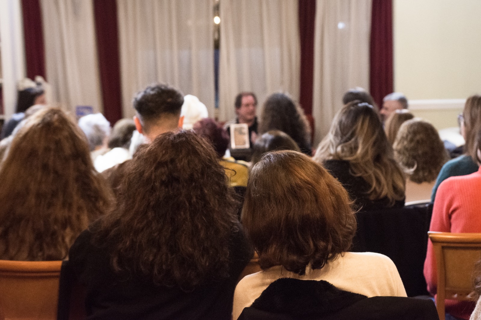 Público en una charla o presentación de LUL
